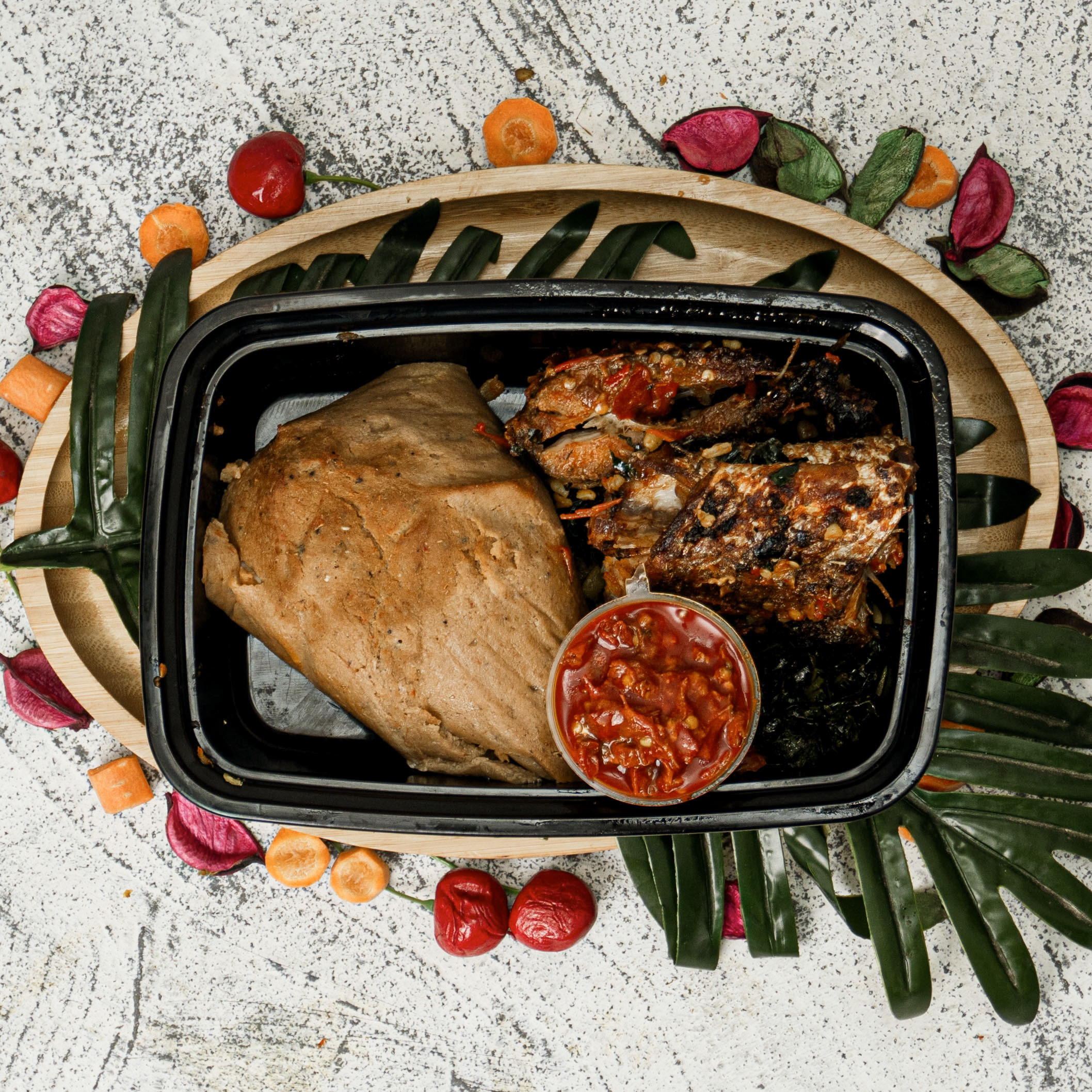 Moi-moi / croaker fish / leafy green veg