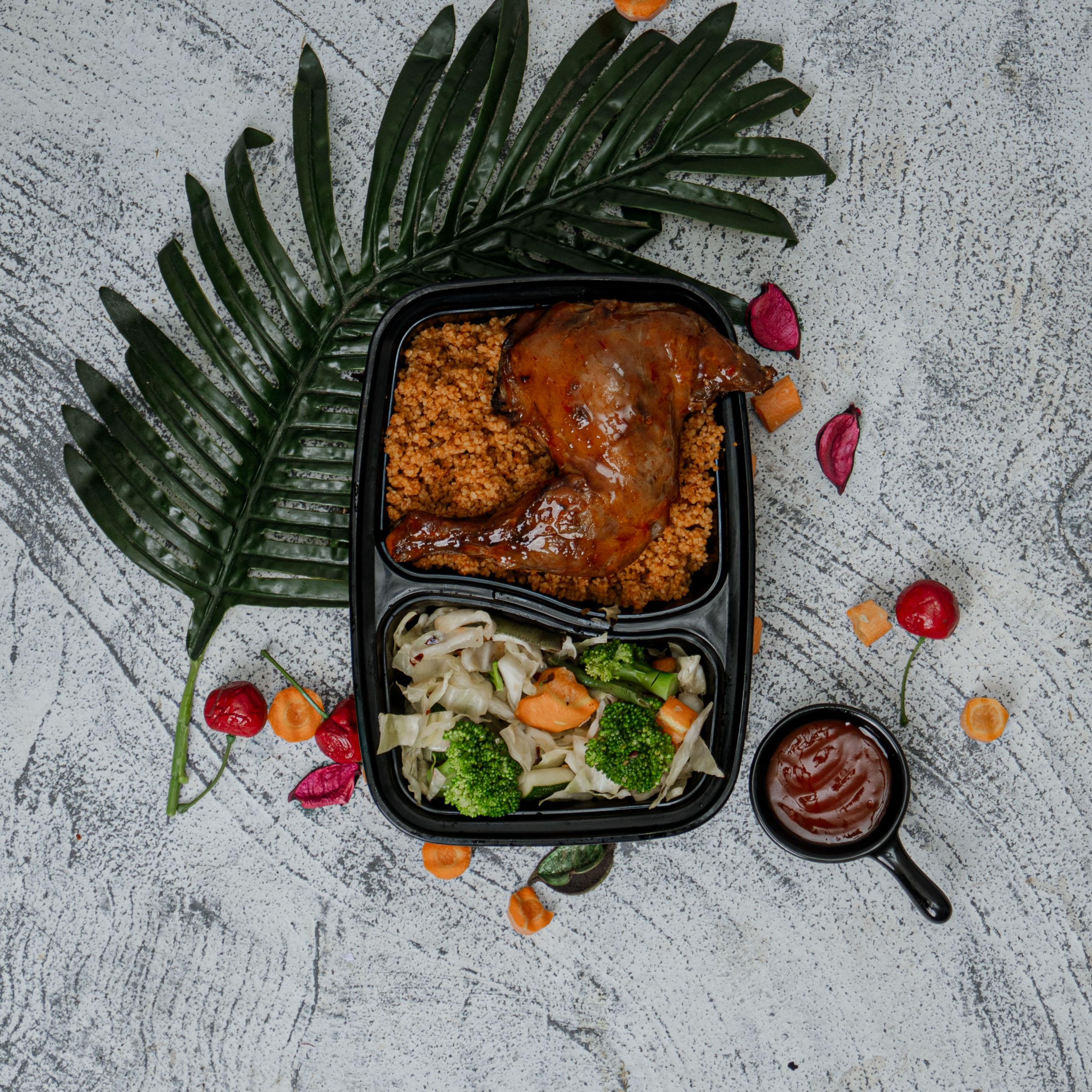 Jollof couscous/ Grilled chicken thighs/ Stir fry veg