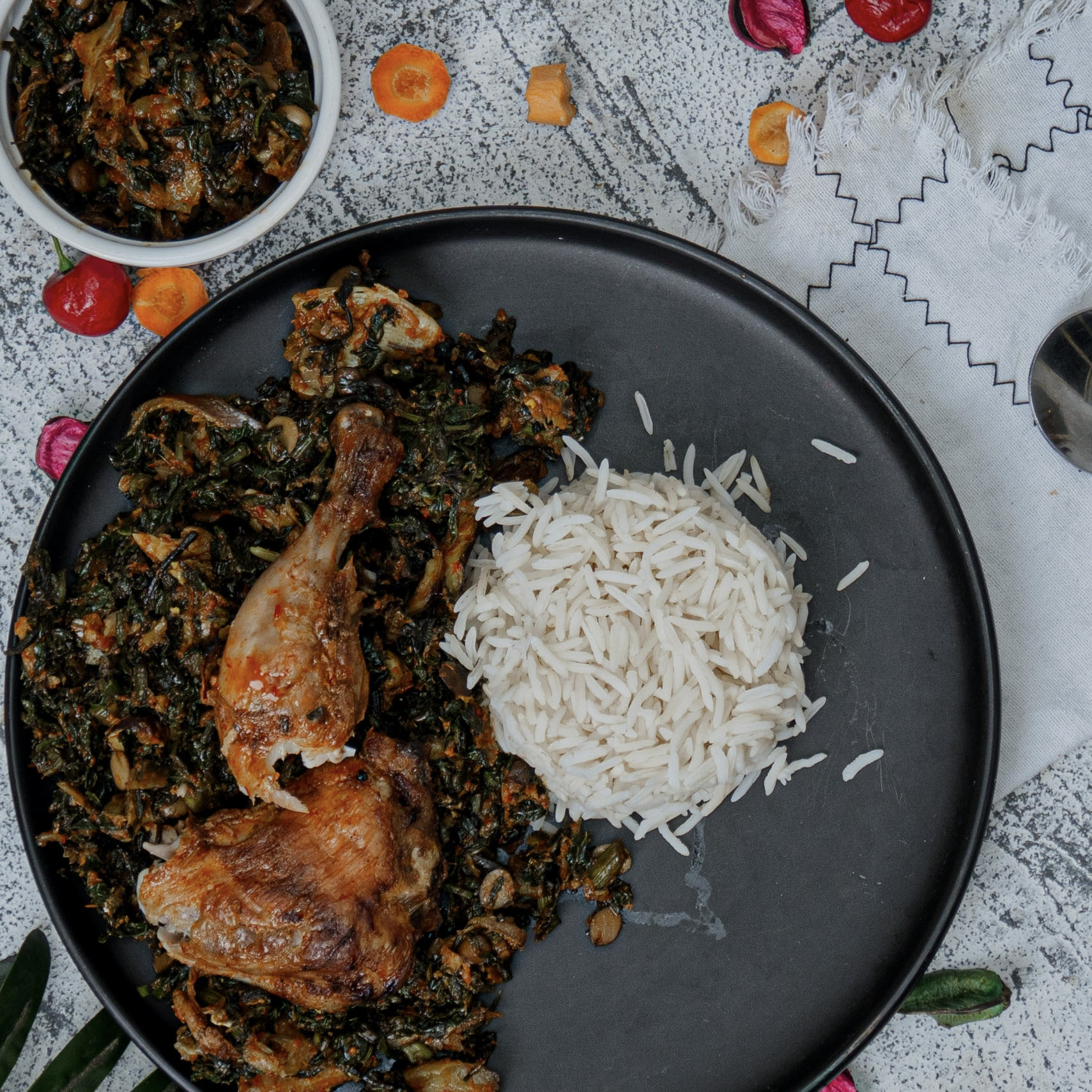 Basmati rice / oil-less efo riro / grilled chicken thighs